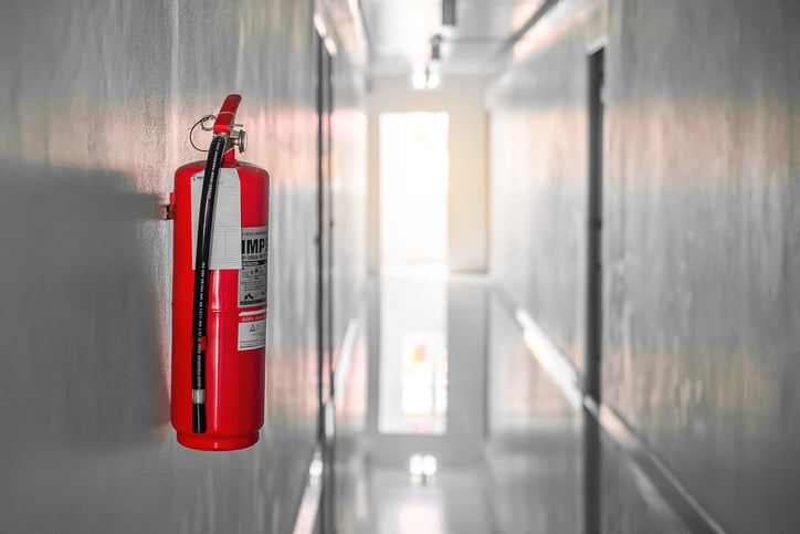 Fire extinguisher system on the wall background, powerful emergency equipment for industrial